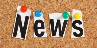 The word “News” is pinned to a bulletin board.